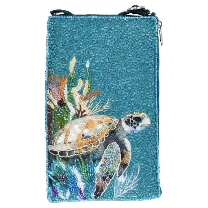 Blue zippered wallet with a sea turtle and coral underwater design
