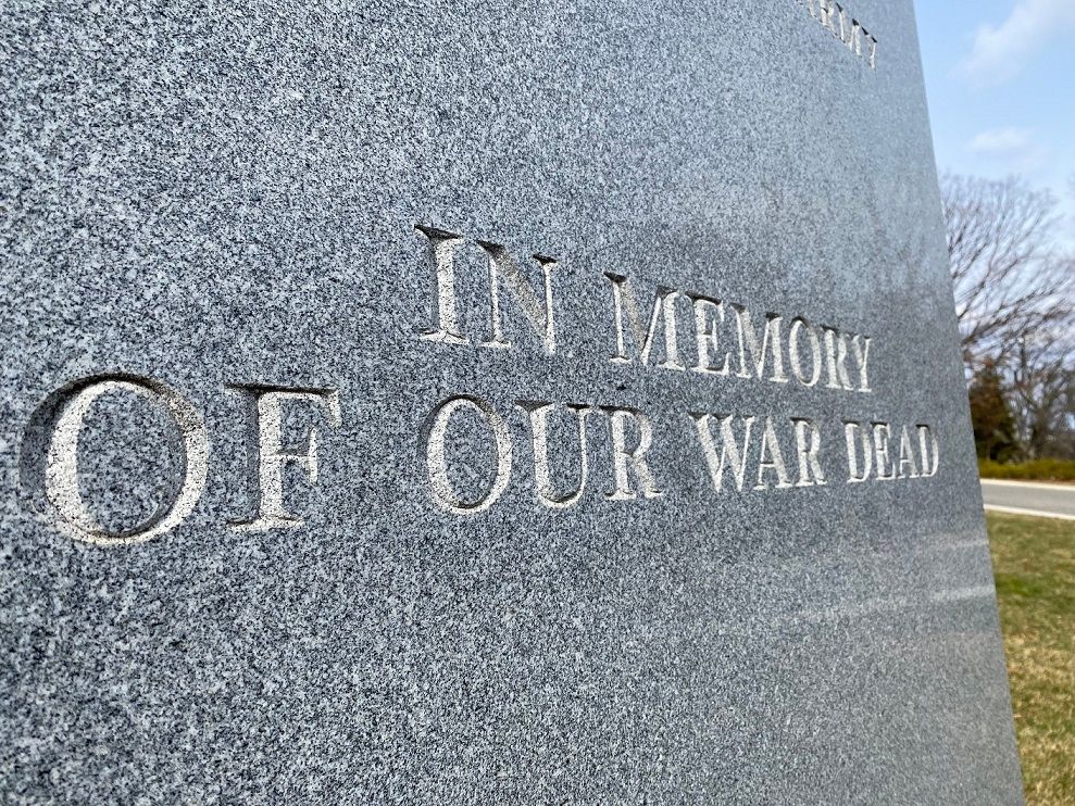Close-up of a granite memorial inscribed with 