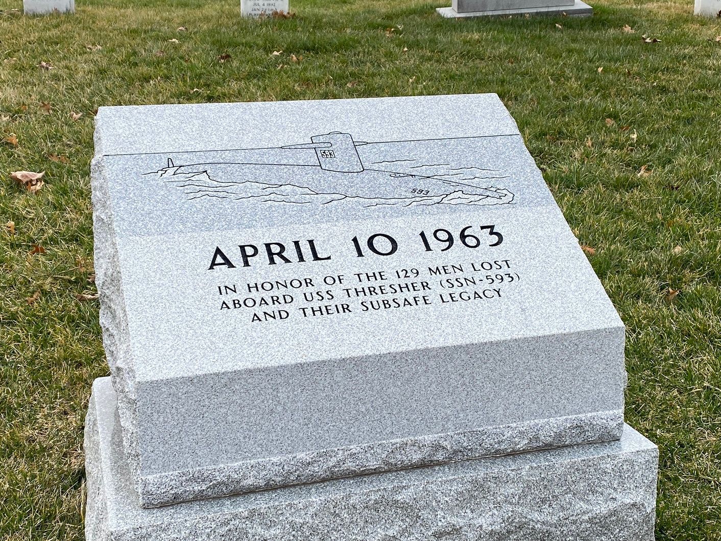 Gray granite tombstone with inscription 