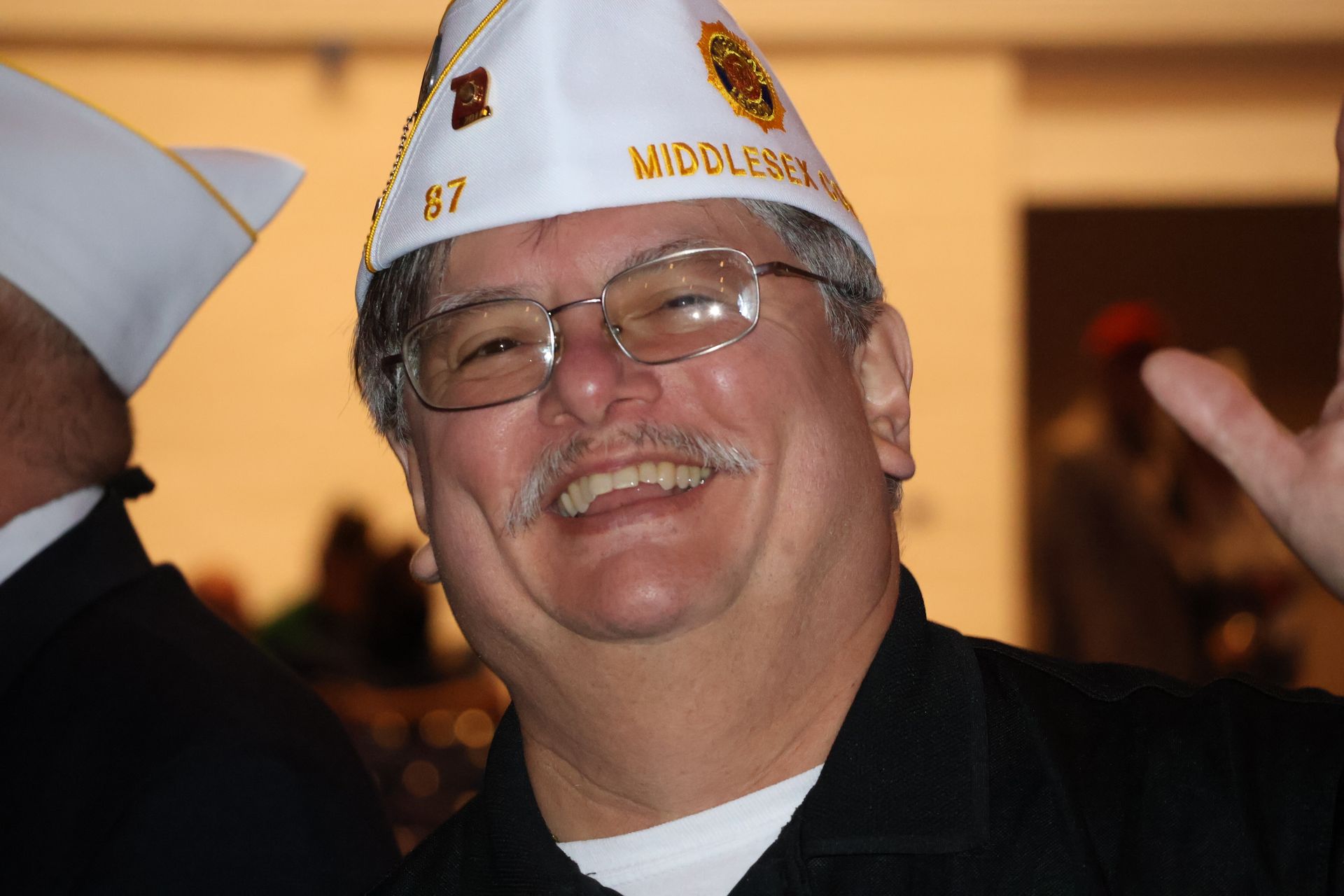 Man in white hat with 