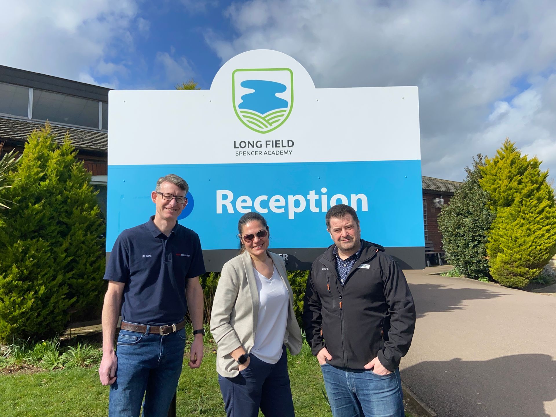 Richard, Aneta and Alan Infront of Long Field Spencer Academy