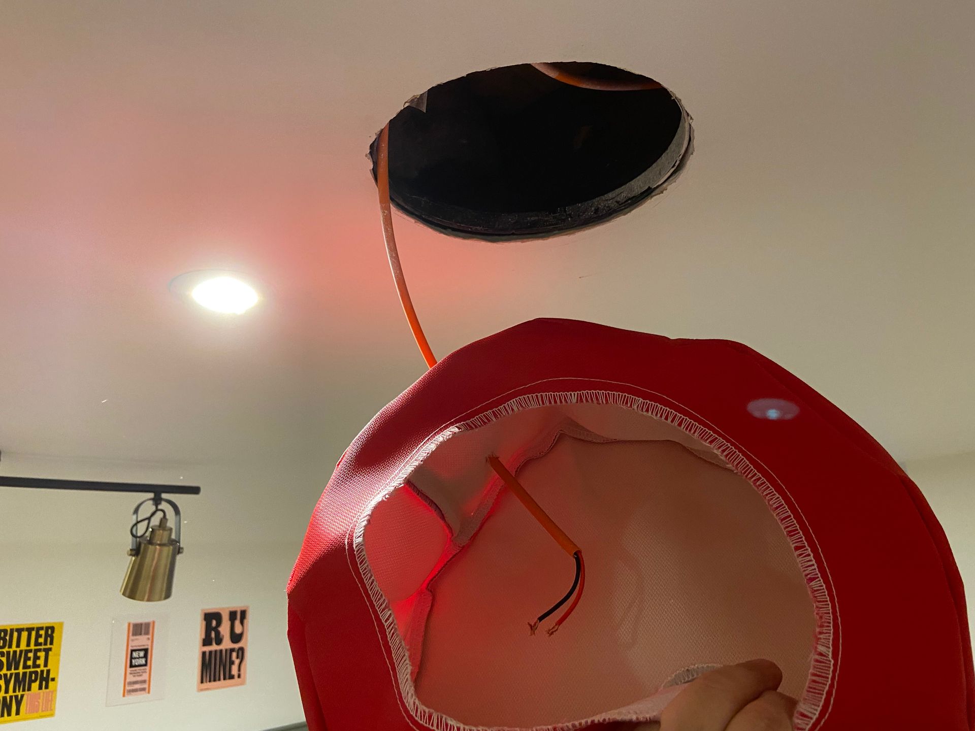 Speaker firehood prior to being installed in ceiling