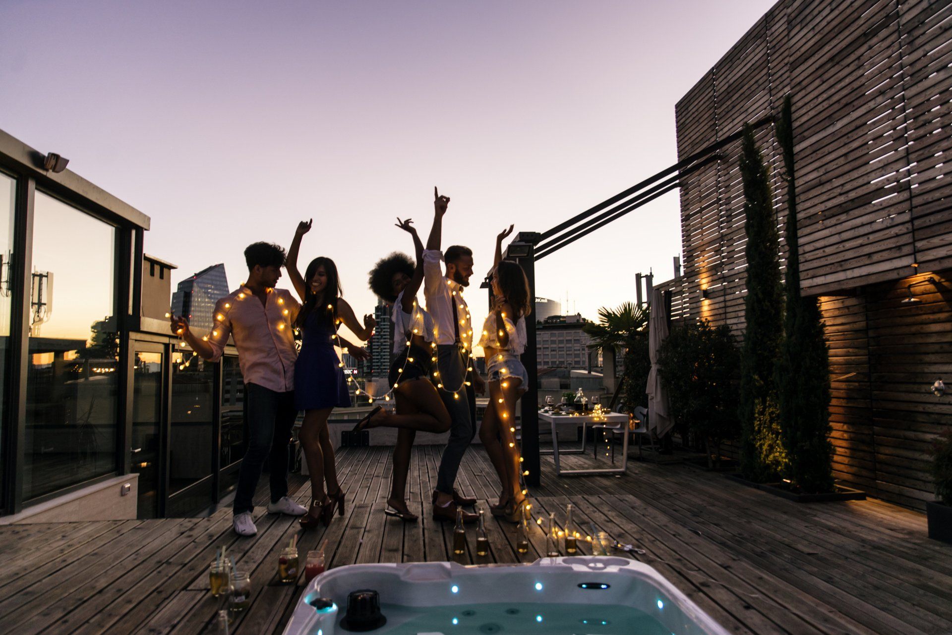 People partying on a rooftop terrace