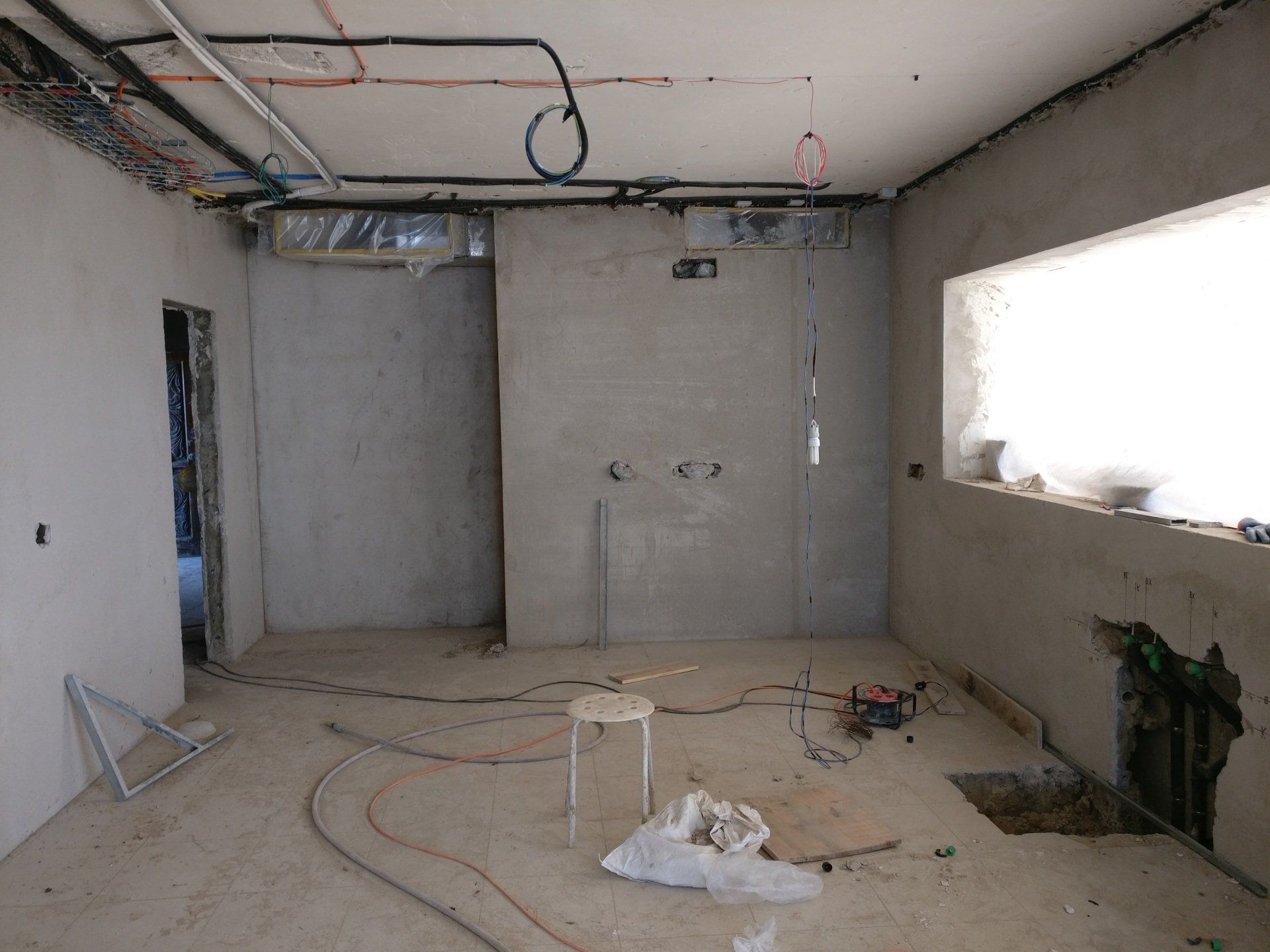 Photograph of cables coiled on ceiling