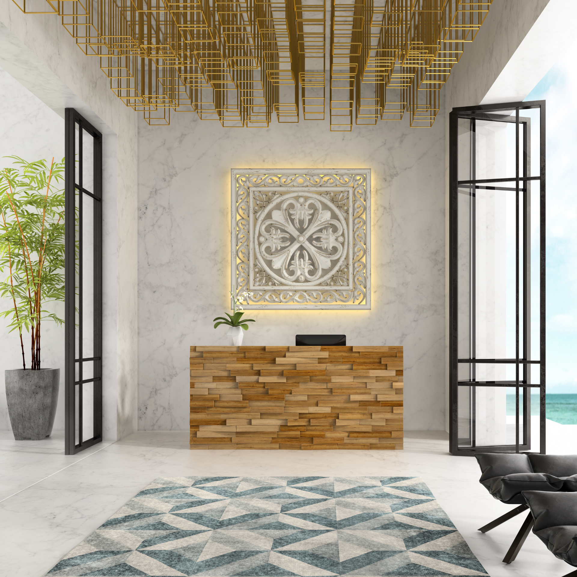 Reception area with wooden desk, stone wall art, rug, and ocean view.