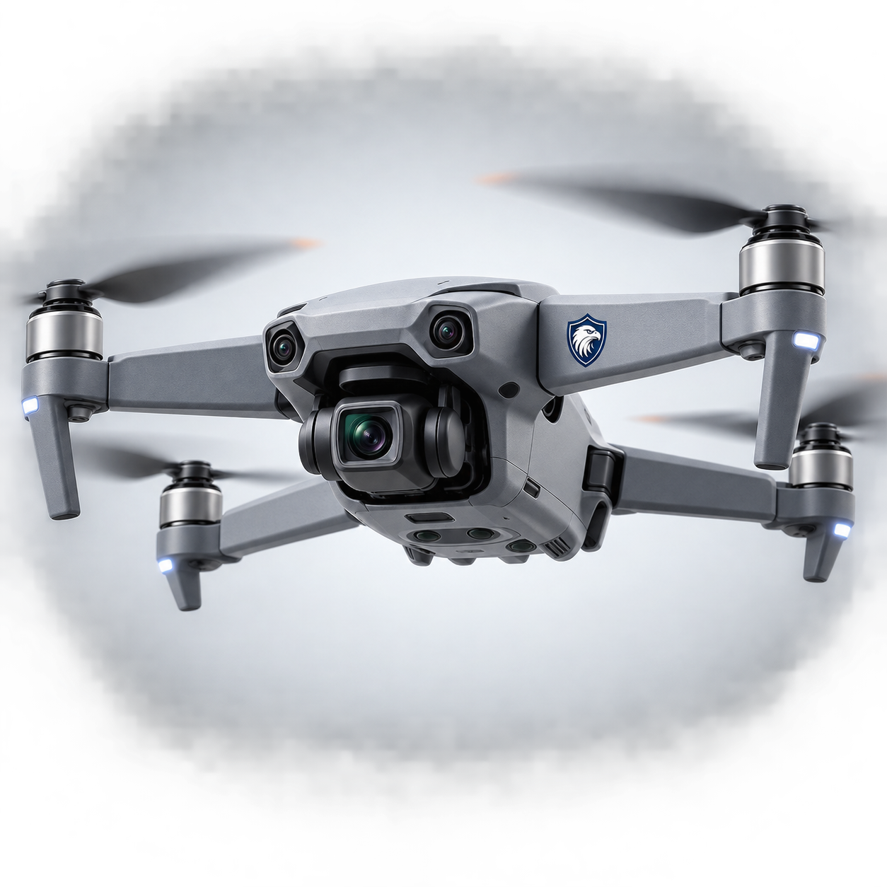 Dron gris oscuro con cuatro hélices, módulo de cámara y varios sensores.