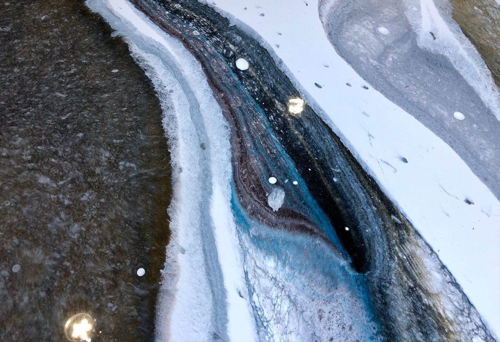 A close up of a marble painting on a table.
