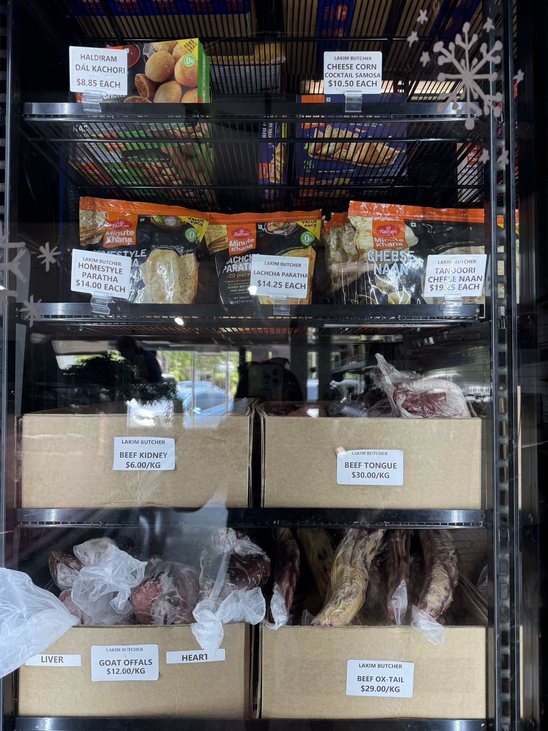 A Refrigerator Filled With Lots Of Food Including Meat And Vegetables — Lakim Butcher In Parap, NT 