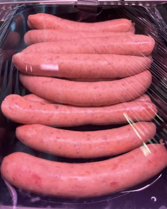 A Bunch Of Sausages Are Stacked On Top Of Each Other — Lakim Butcher In Parap, NT 