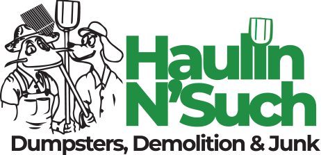 Logo for Haulin N' Such featuring two cartoon workers holding tools next to green text that reads