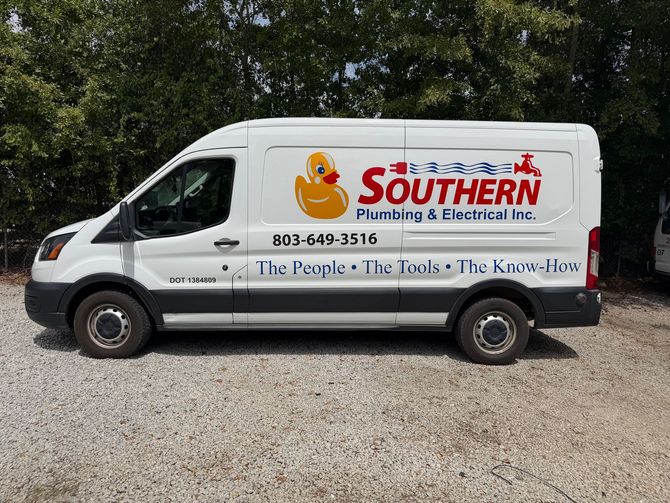 White Southern Plumbing & Electrical service van parked on gravel under trees