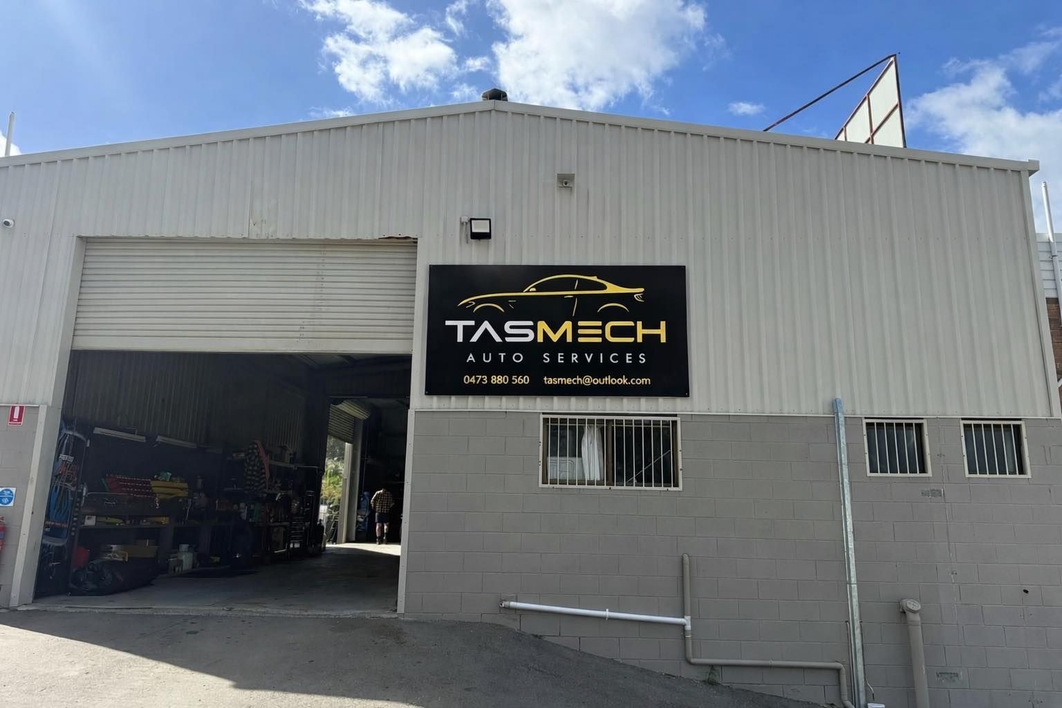 The Exterior of TasMech Auto Services, Featuring a White Metal Building — TasMech Auto Services In Mornington, TAS
