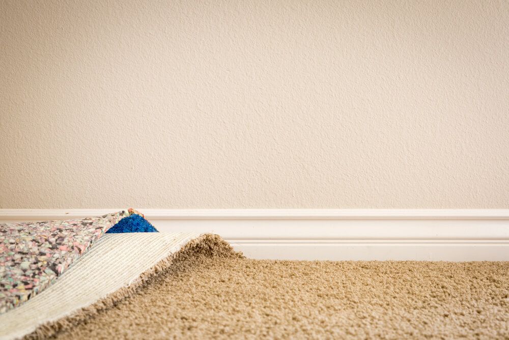Pulled Back Carpet And Padding — Flooring - Bundaberg Carpets and Vinyls