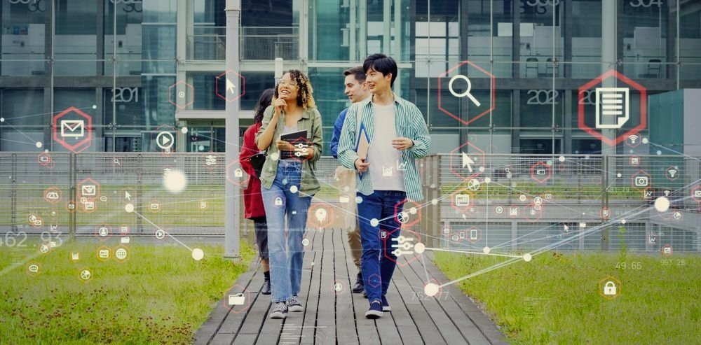 Three students walk on a campus path, overlaid with digital tech icons and grids.