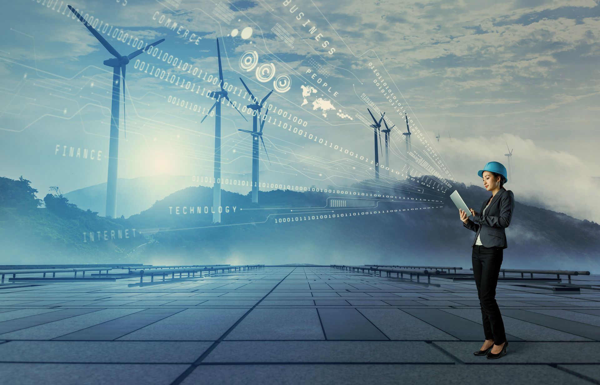 Engineer inspecting wind turbines in a futuristic blue-toned renewable energy landscape