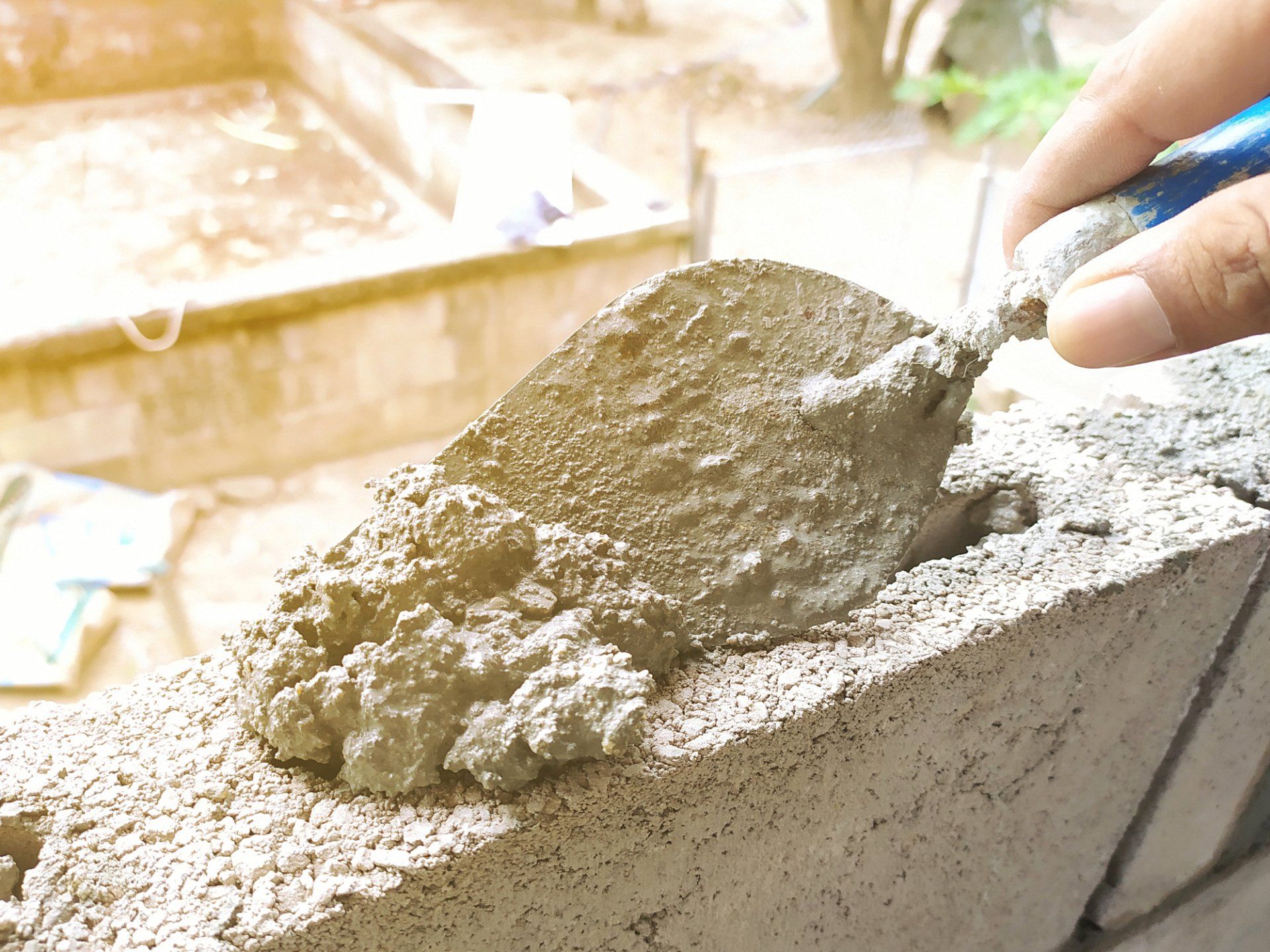 Bricklayer Use Trowel To Make Brick Wall - Tamworth - Woods & Sons Bricklaying
