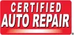 Red sign with white text reading “CERTIFIED AUTO REPAIR”