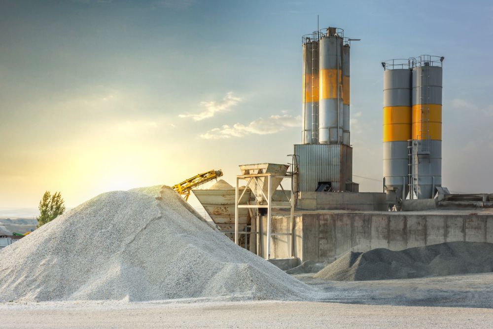 A Factory With a Large Pile of Gravel in Front of It — Hothams In Bathurst, NSW