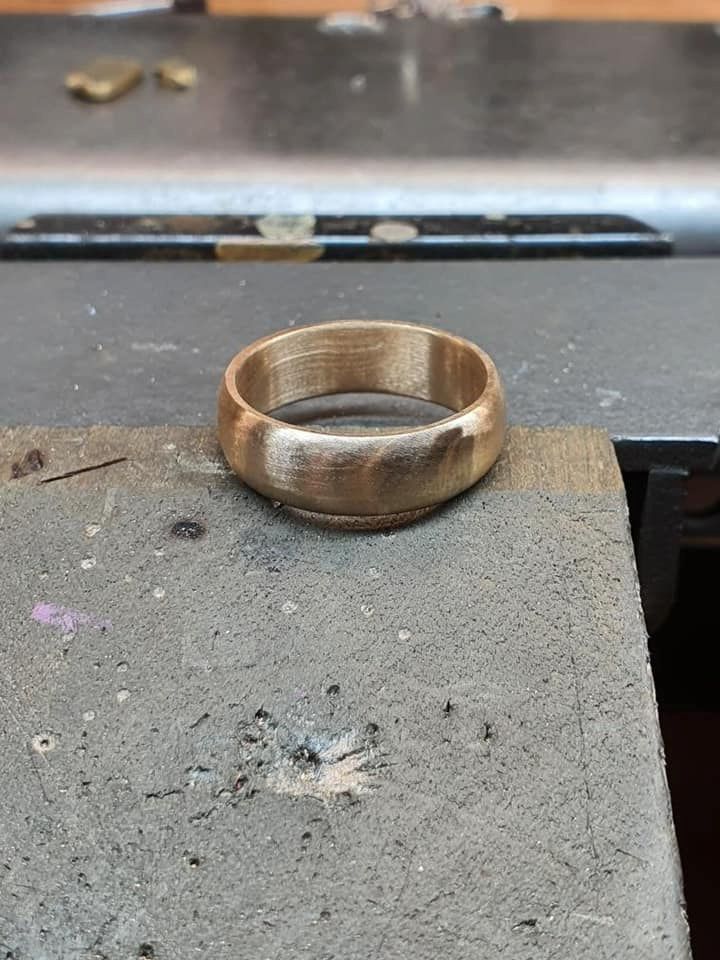 Gold Ring on a Gray Workbench — Chris Williams Retail & Manufacturing Jewellers in Wanguri, NT