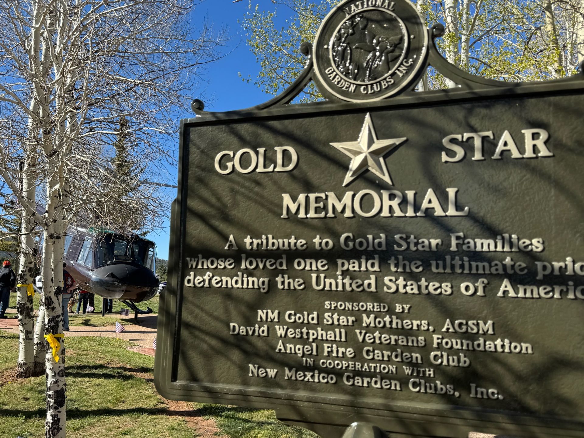 A sign in a park that says gold star memorial