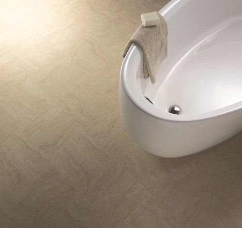 Interior Flooring Newbury |A bathtub with a towel and soap on it