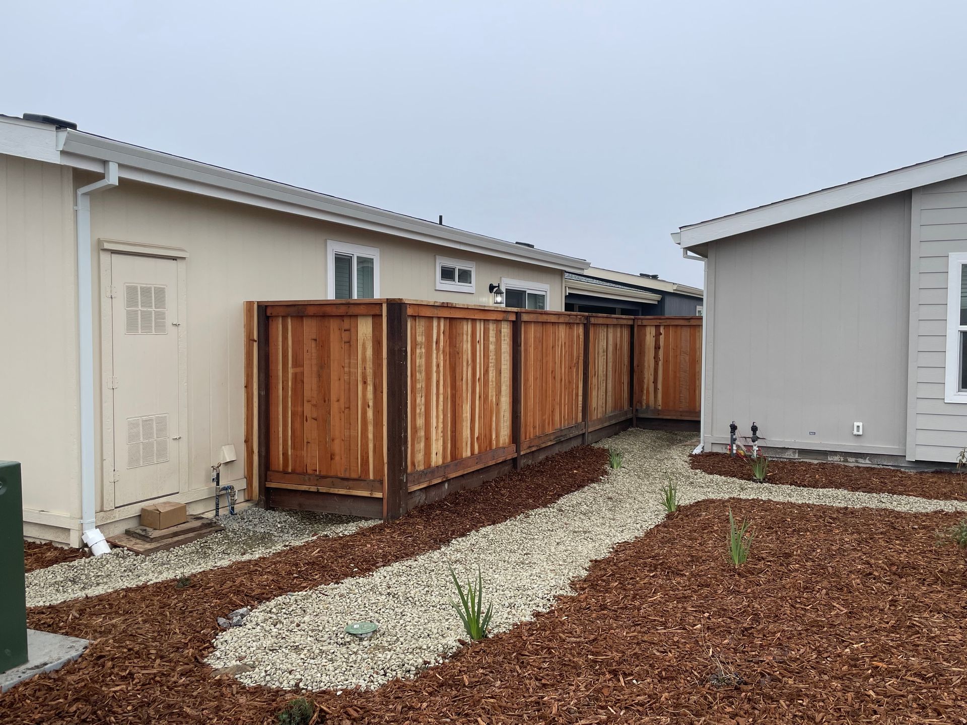 wood fence with steel posts