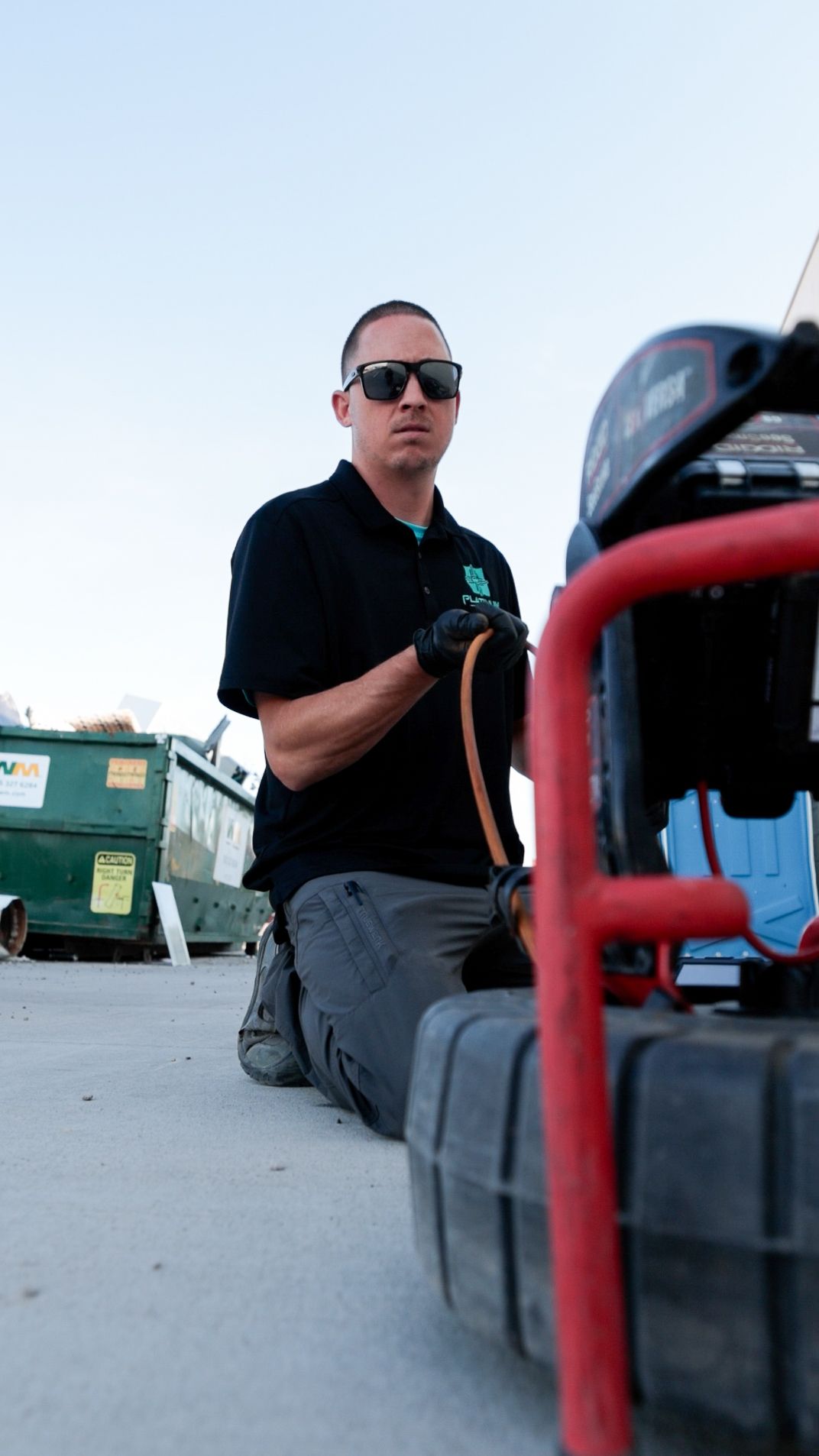platinum plumbing employee is preparing the sewer jetter
