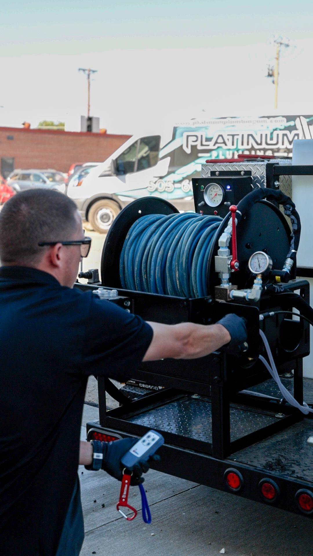 Platinum plumbing employee is using the sewer jetter