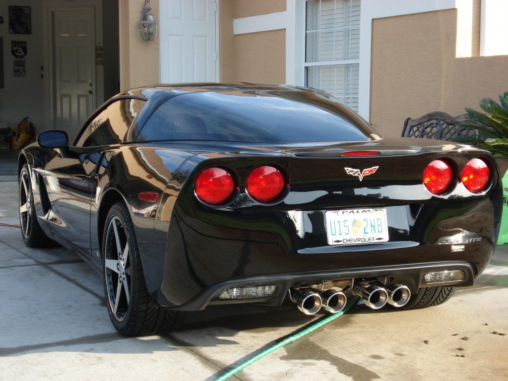 A black sports car with a florida license plate