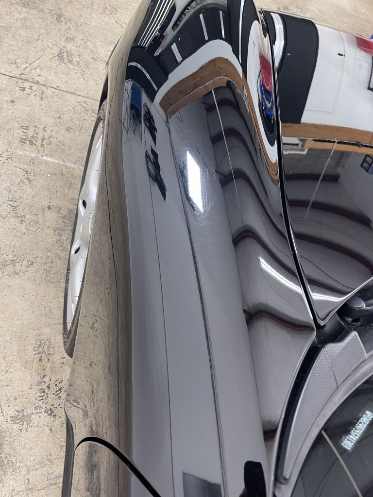 A close up of a car with the hood open