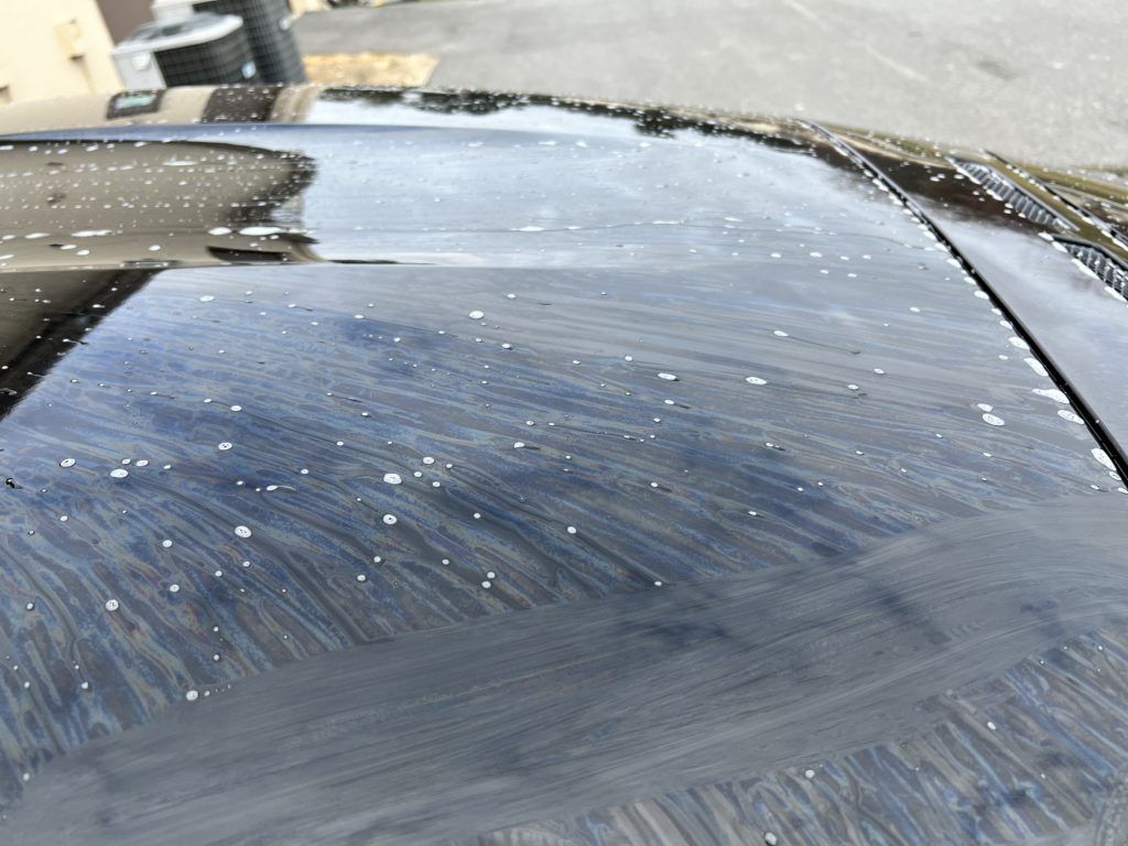 A close up of the roof of a black car