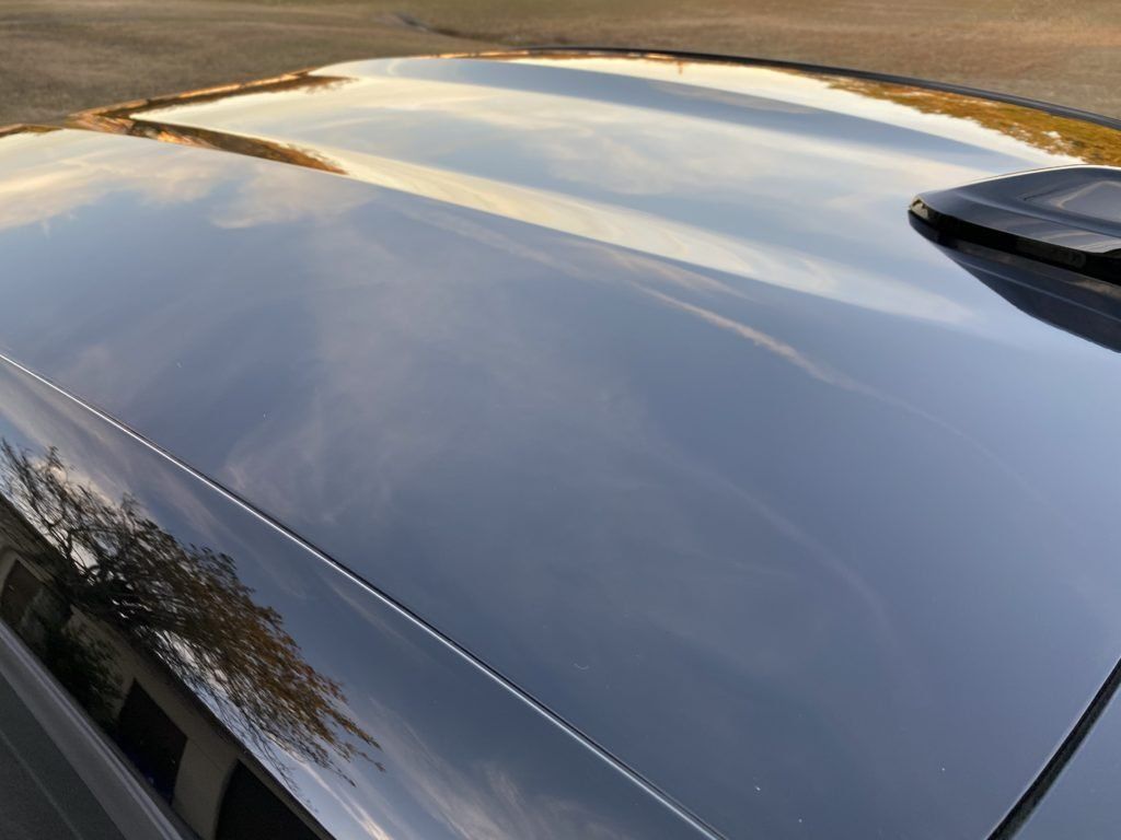 A close up of the roof of a black car