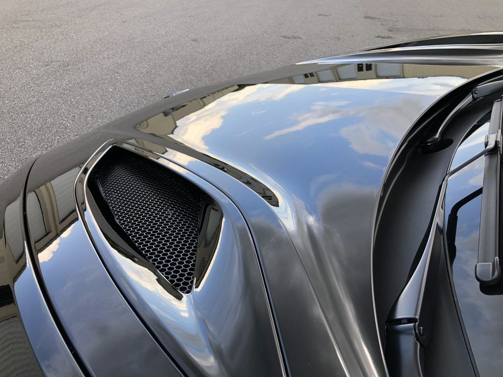 A close up of the hood of a car