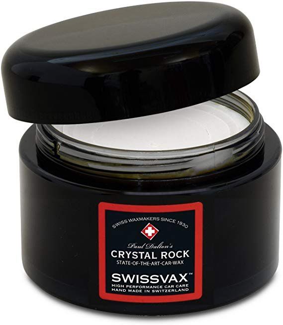 A jar of swissvax crystal rock wax with the lid open