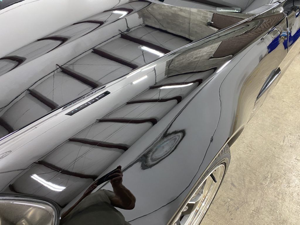 A close up of the hood of a car