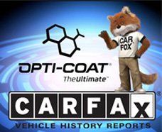 A mascot is standing in front of a carfax logo.