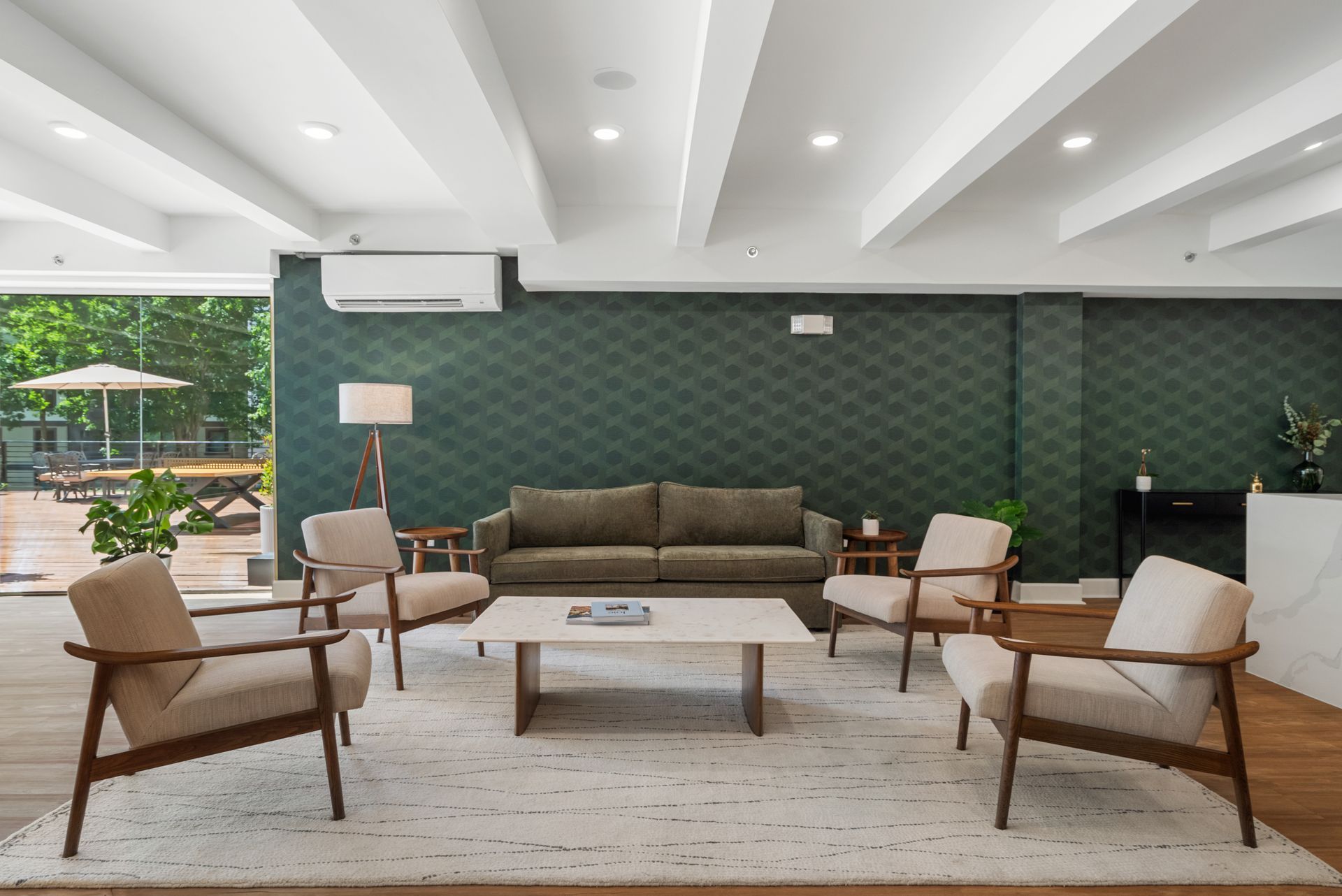 Natural-colored decor and furnishings in the lobby at Clairmont Crest senior living apartments in Decatur, GA.