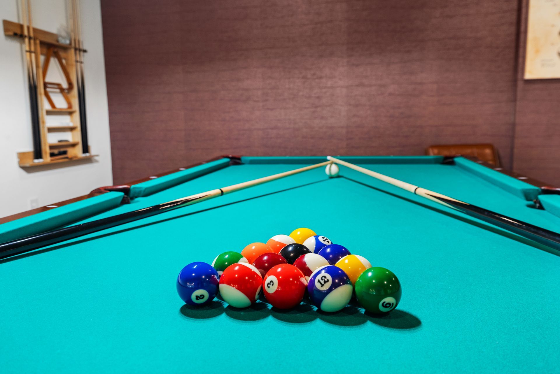Billiards table set for a game at Clairmont Crest senior living apartments in Decatur, GA.