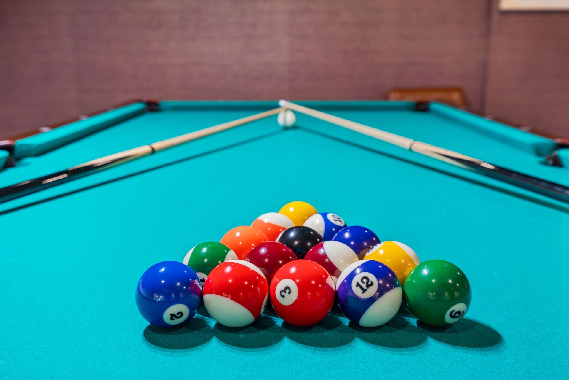 Closeup of the well-maintained billiards table at Clairmont Crest senior living apartments in Decatur, GA.