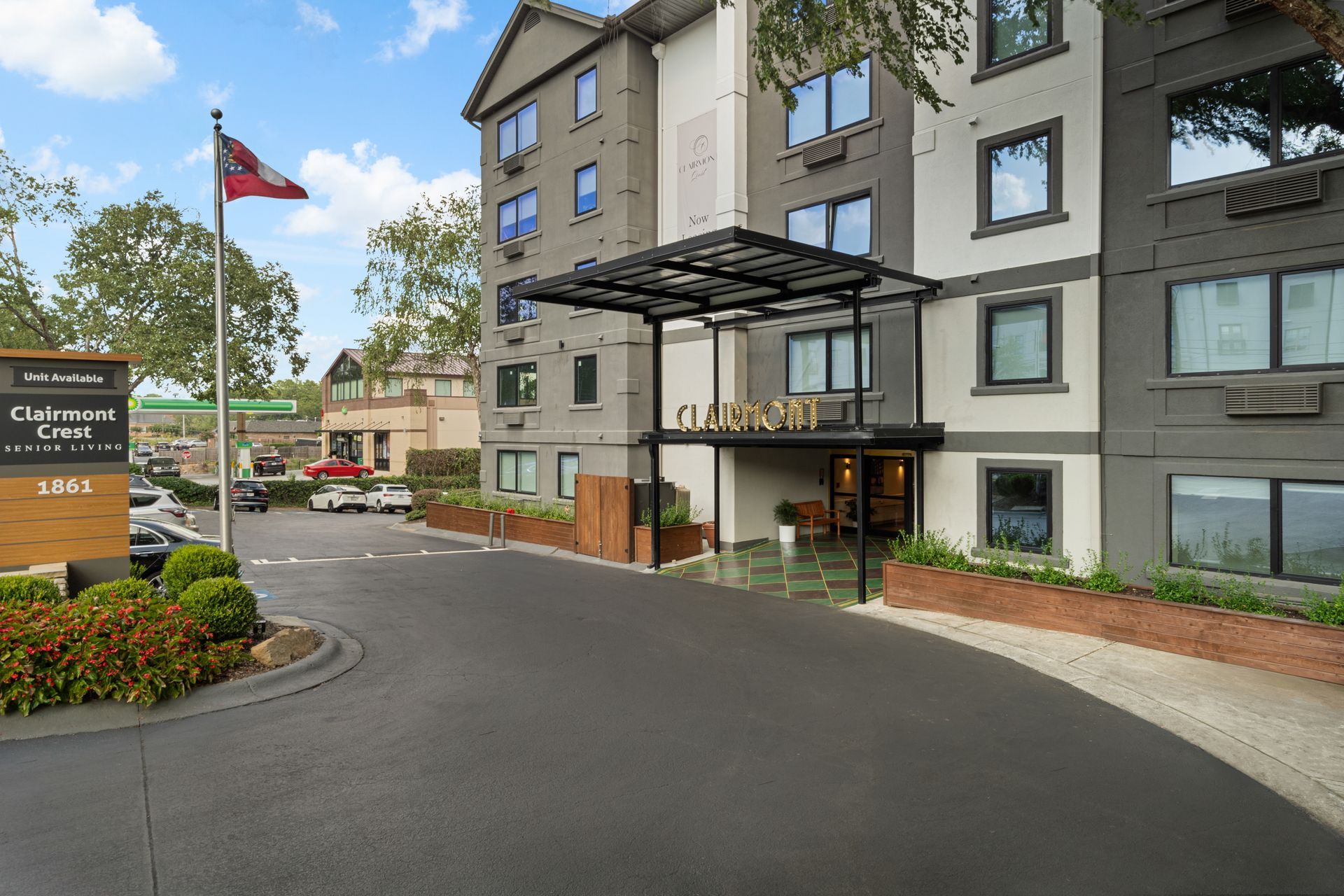 Well-maintained driveway at the entrance to Clairmont Crest senior living apartments in Decatur, GA.