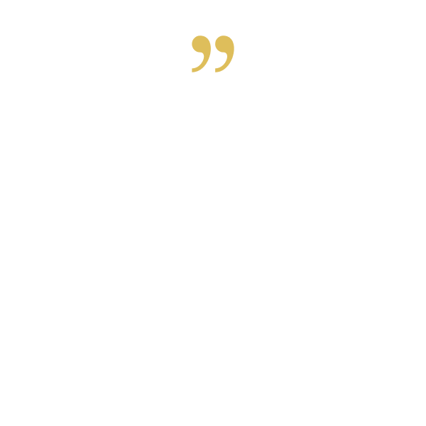 A white background with two gold quotation marks on it.