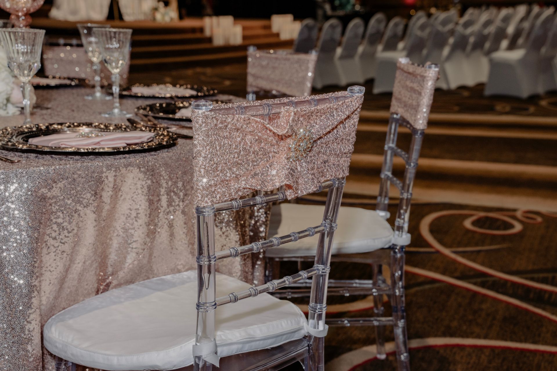 A couple of chairs are sitting next to each other on a table.