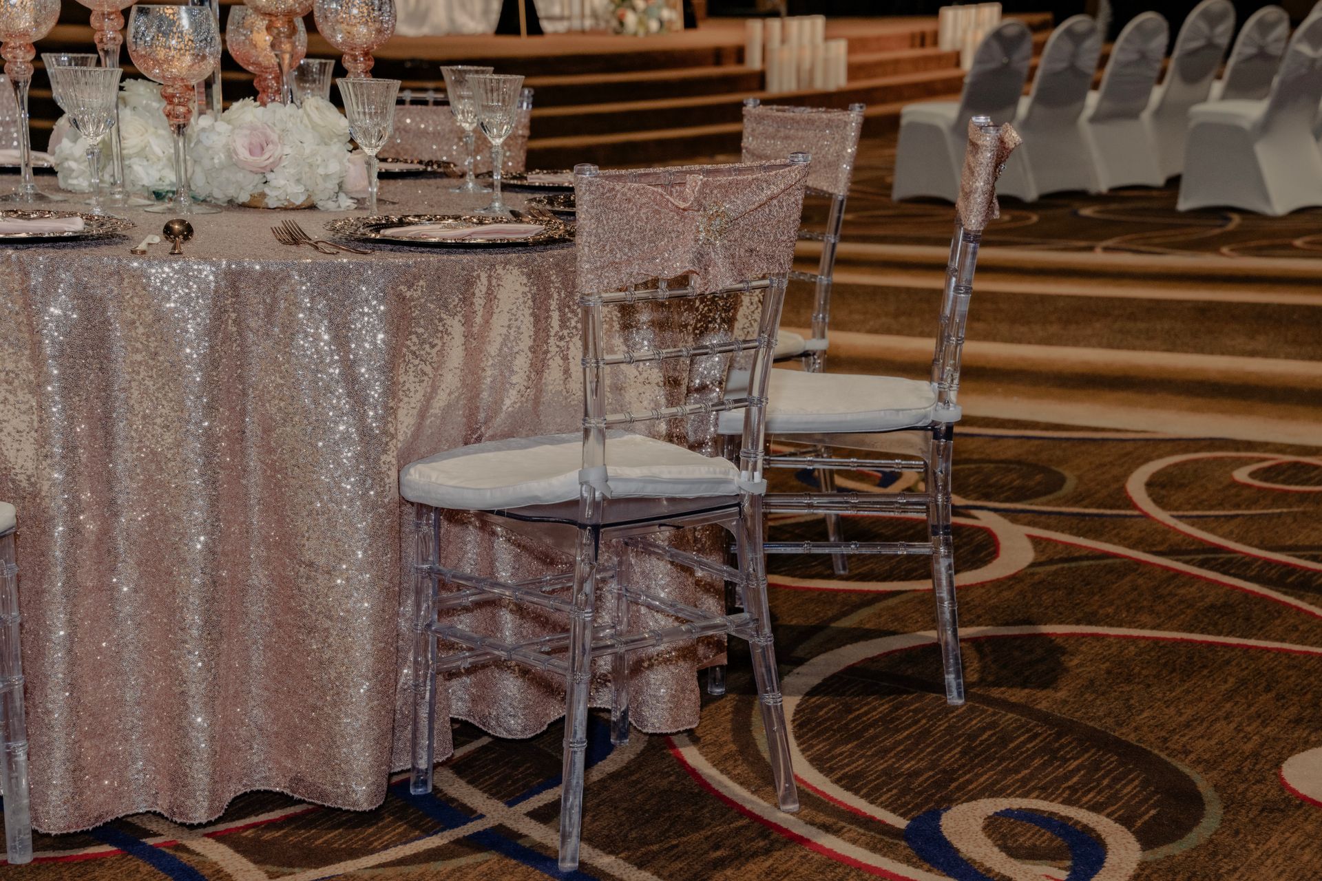A table and chairs are set up for a wedding reception.