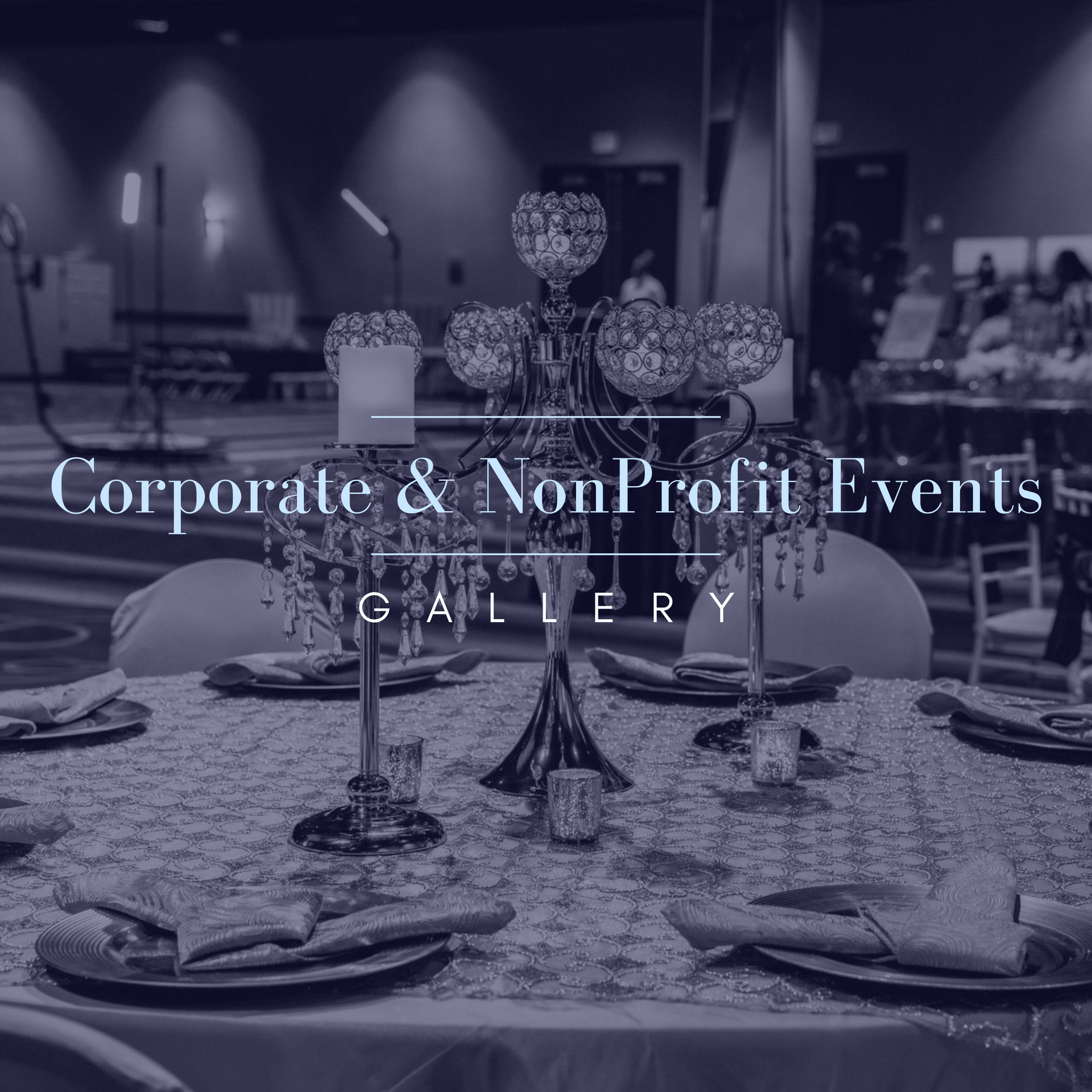 Table setting with centerpieces at a corporate or non-profit event.