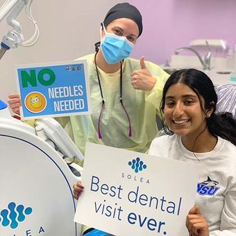 dr ripa and woman smiling