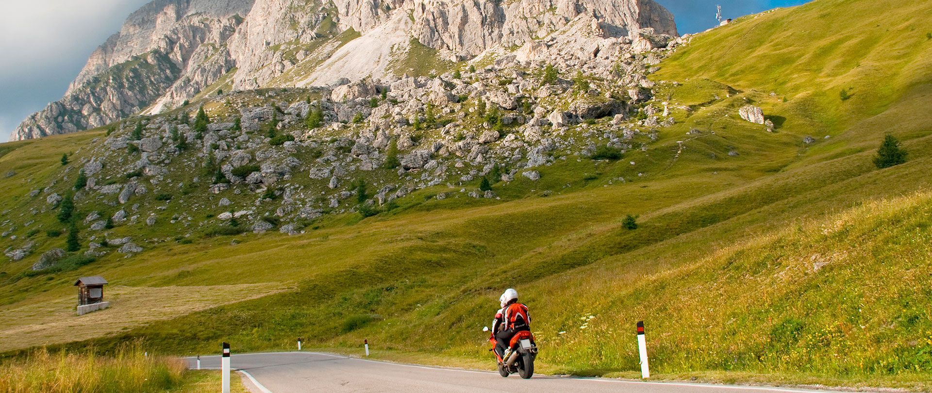Curvy fun in the Dolomites, mountain panorama included