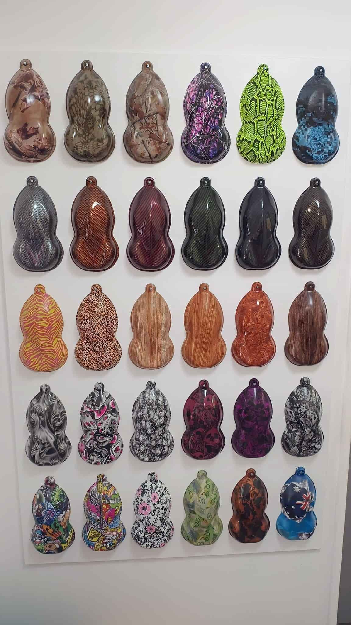 A Wall With a Bunch of Different Colored Bottles on It — Dynamic 2-Pack In Rockville, QLD