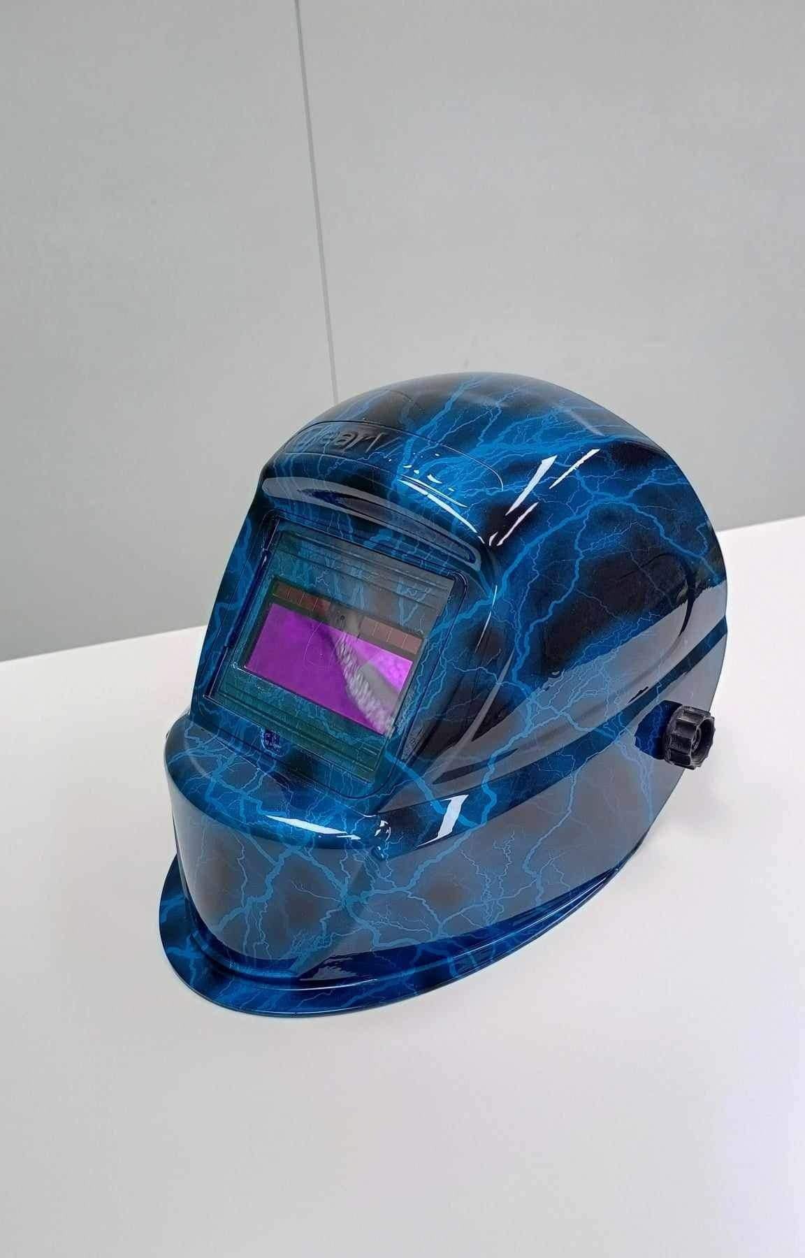 A Blue Welding Helmet is Sitting on Top of a White Table — Dynamic 2-Pack In Rockville, QLD