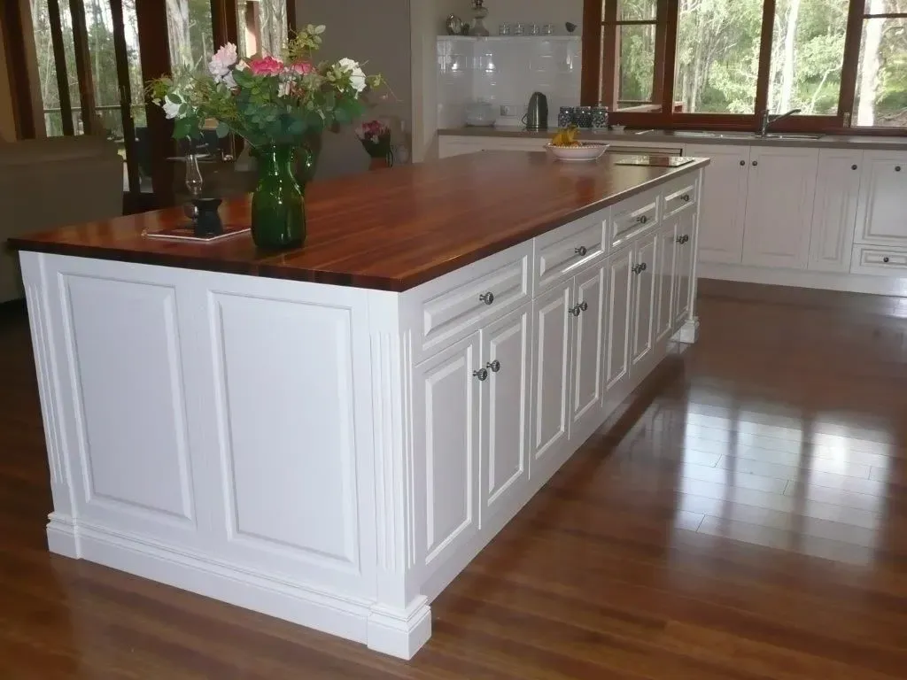 A Kitchen With White Cabinets and a Wooden Counter Top — Dynamic 2-Pack In Rockville, QLD