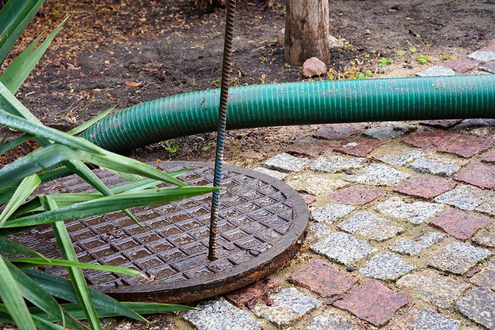 Septic Tank With Metal Cover — Parkton, NC — J & L Septic Tank Services Septic Tank With Metal Cover — Parkton, NC — J & L Septic Tank Services
